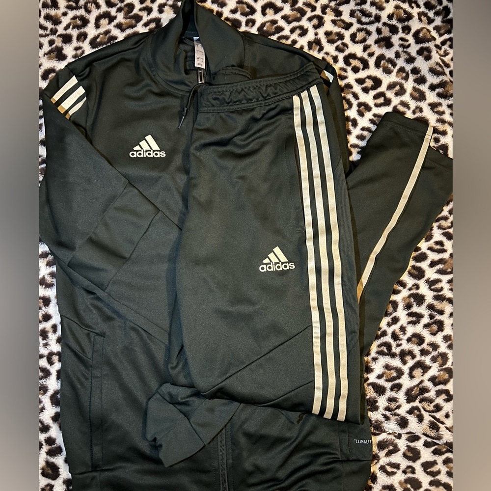 Green and gold adidas track suit